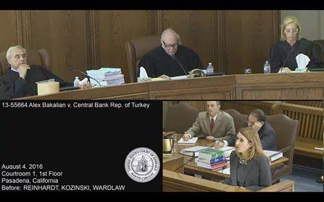 A screenshot from the video stream of today's hearing today before a panel of the 9th Circuit Court, which heard oral arguments for Bakalian v. Republic of Turkey, a class action lawsuit filed in 2010 in California court by three Armenian-Americans who are demanding compensation from Turkey for its role in confiscating the property of their ancestors during the 1915 Genocide. Seen on top are the three judges, (from left to right), Alex Kozinski, Stephen Reinhardt, and Kim McLane Wardlaw. In the bottom right is attorney for the plaintiffs, Kathryn Lee Boyd.